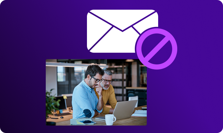 Mail Assure email protection illustration showing a blocked email icon above a user working at a laptop, representing prevention of spam, phishing, and malicious messages.
