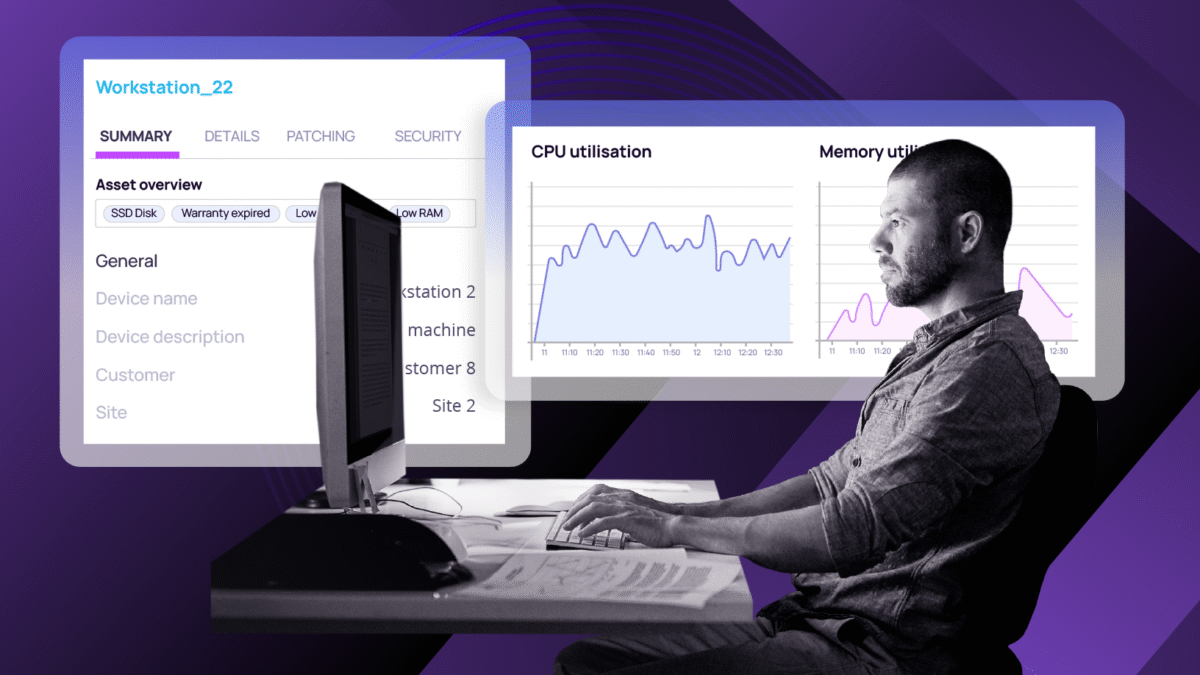 IT professional working at a desk with dual monitors displaying workstation details, CPU utilization, and memory usage graphs, representing system visibility and performance monitoring