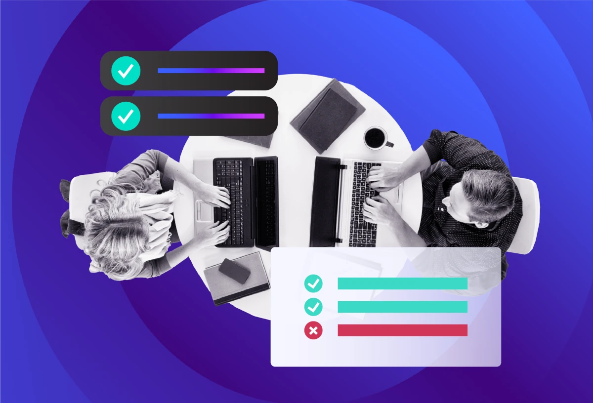 Top‑down view of two professionals working on laptops at a round table, overlaid with task checkmarks and status bars, representing collaborative ransomware protection and risk assessment.